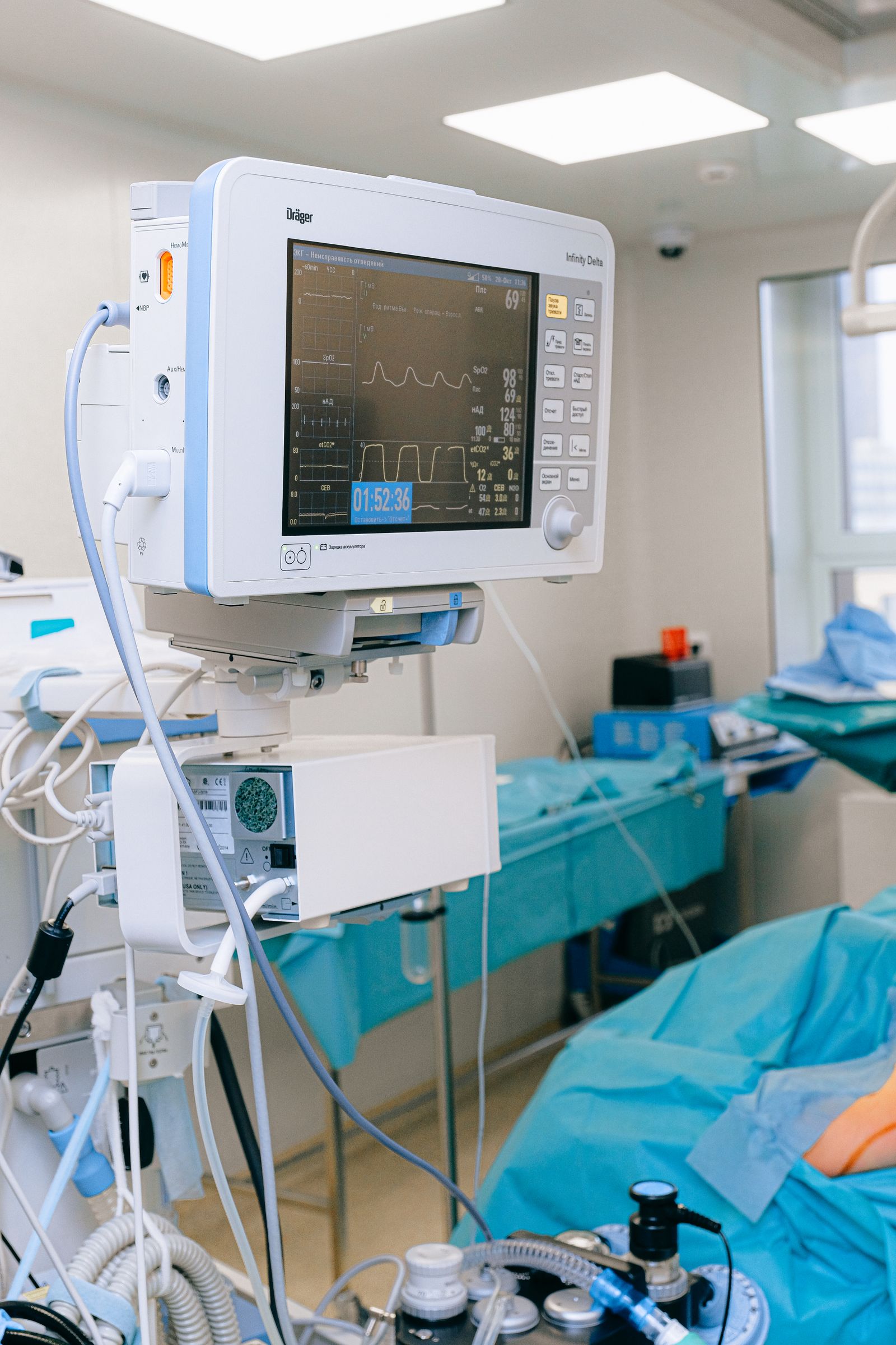 Patient vital signs monitor displaying heart rate, blood pressure, and oxygen saturation